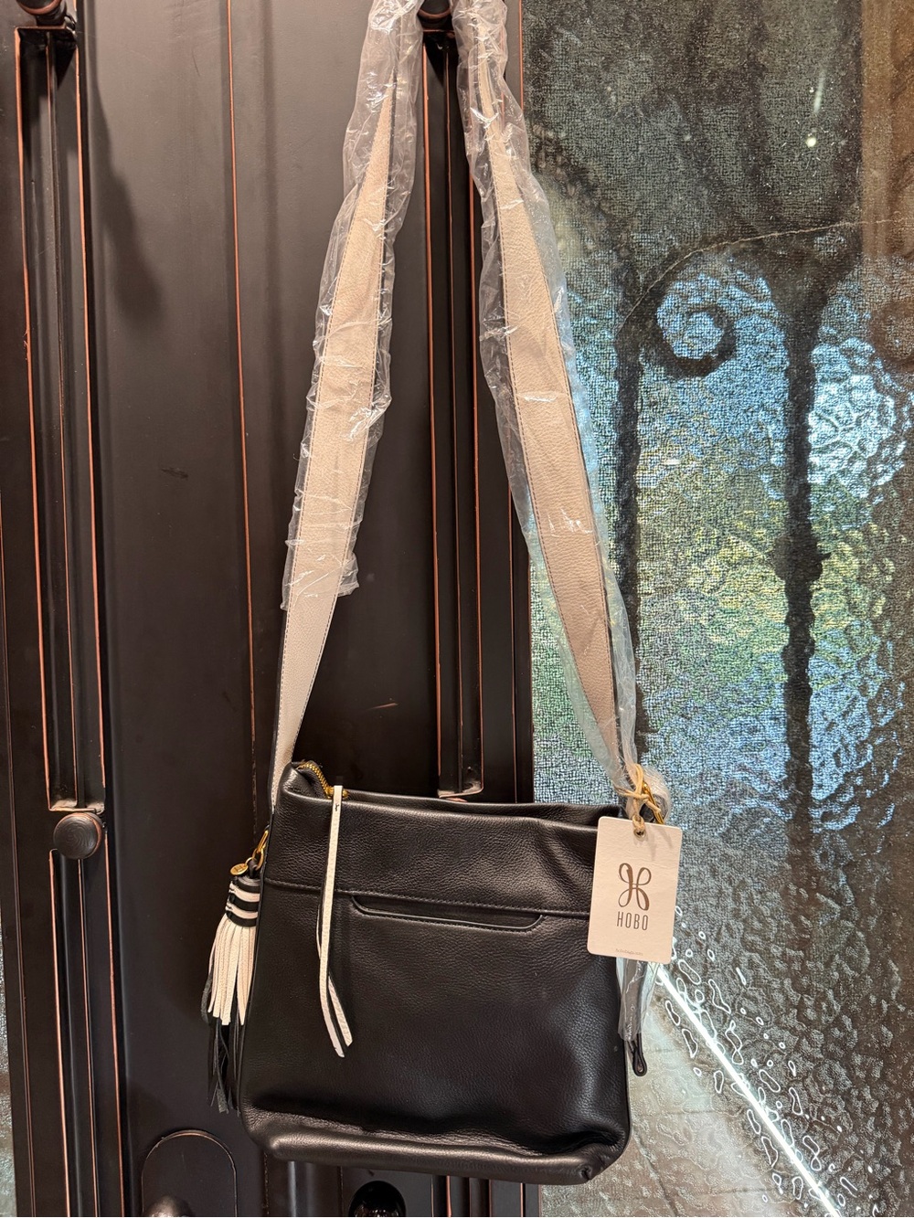HOBO Black Pebble Leather Crossbody with white Contrast Strap.NWT